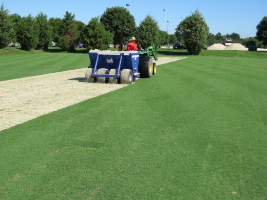1/4" of Sand Being Applied to Riviera Side of Field 17